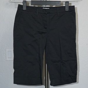 New York & Company black trouser short. Falls a little below the knee.